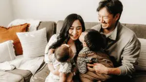 Nannytax Blog How Nannytax helps families Candid shot of a family on the sofa
