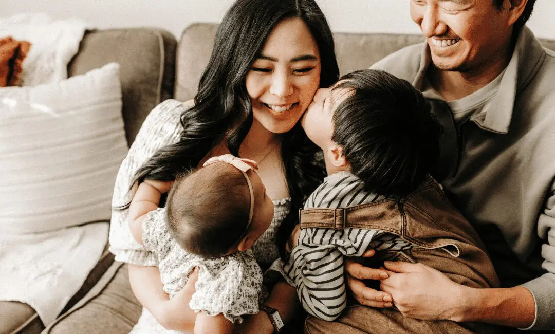 Candid shot of a family on the sofa